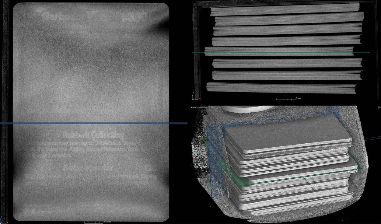 CT scan output of a sealed Pokémon booster box showing card layers